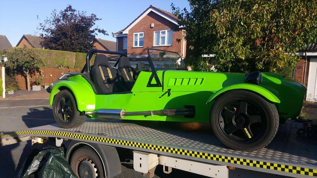 Green caterham on back of recovery vehicle on it ways to it new owner
